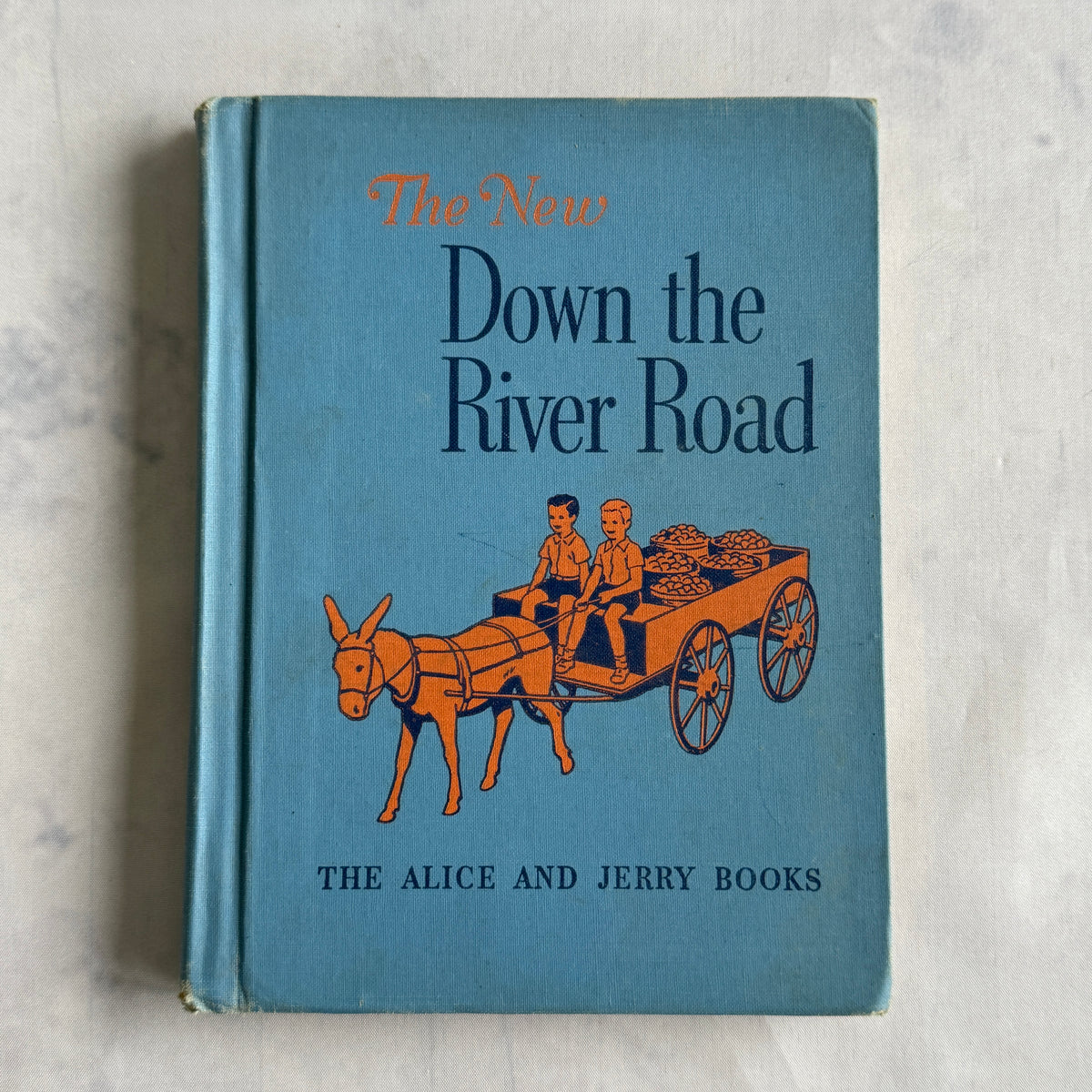 The New Down the River Road 1952 Alice and Jerry reader, blue cloth cover with donkey cart