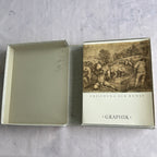 Open box with text volume and pencil notes inside lid