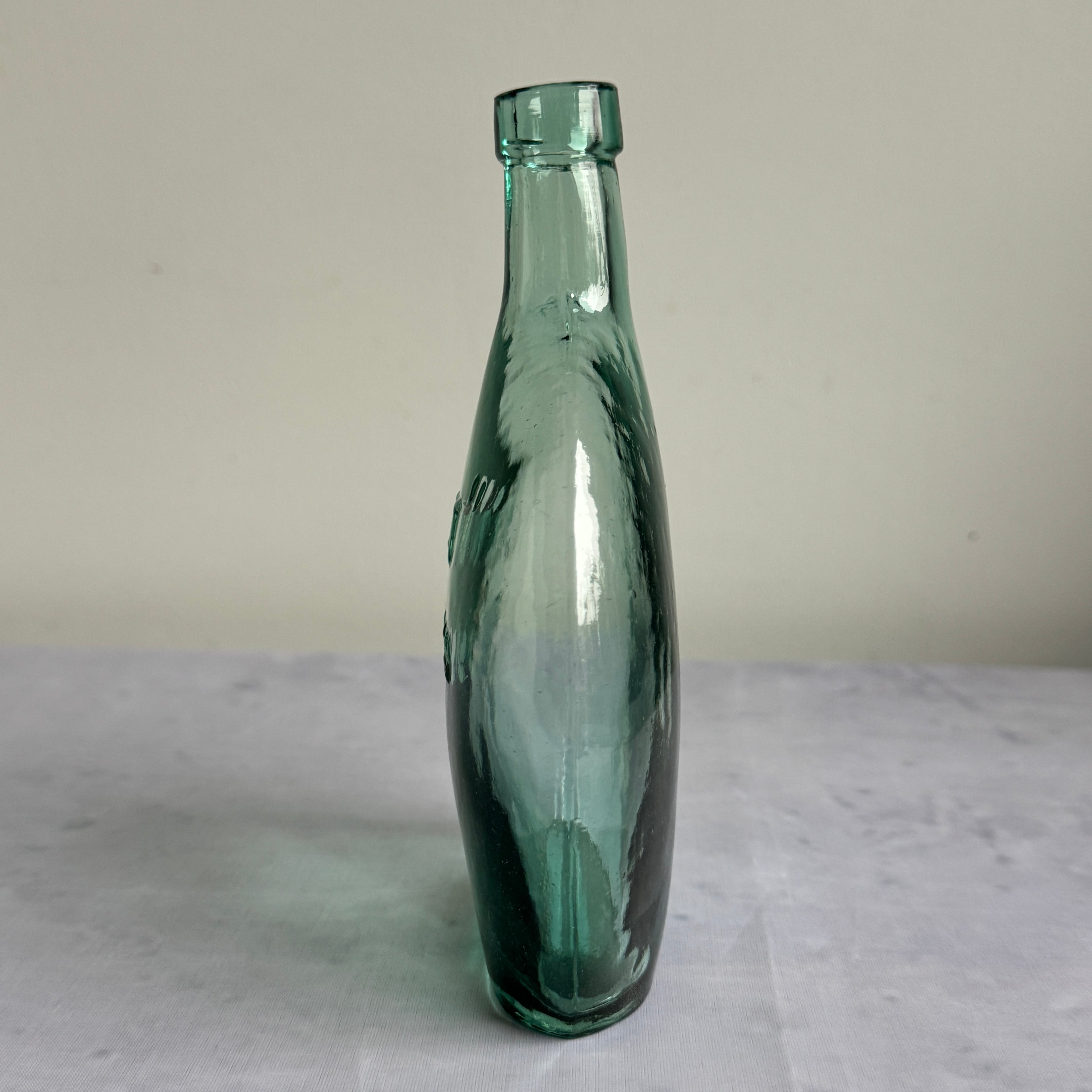 Pre-War Estonian Embossed Glass Bottle "KOIT" Tallinn c.1920–1940