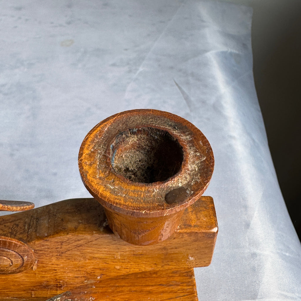 Close-up of second candle cup showing wear and wax residue