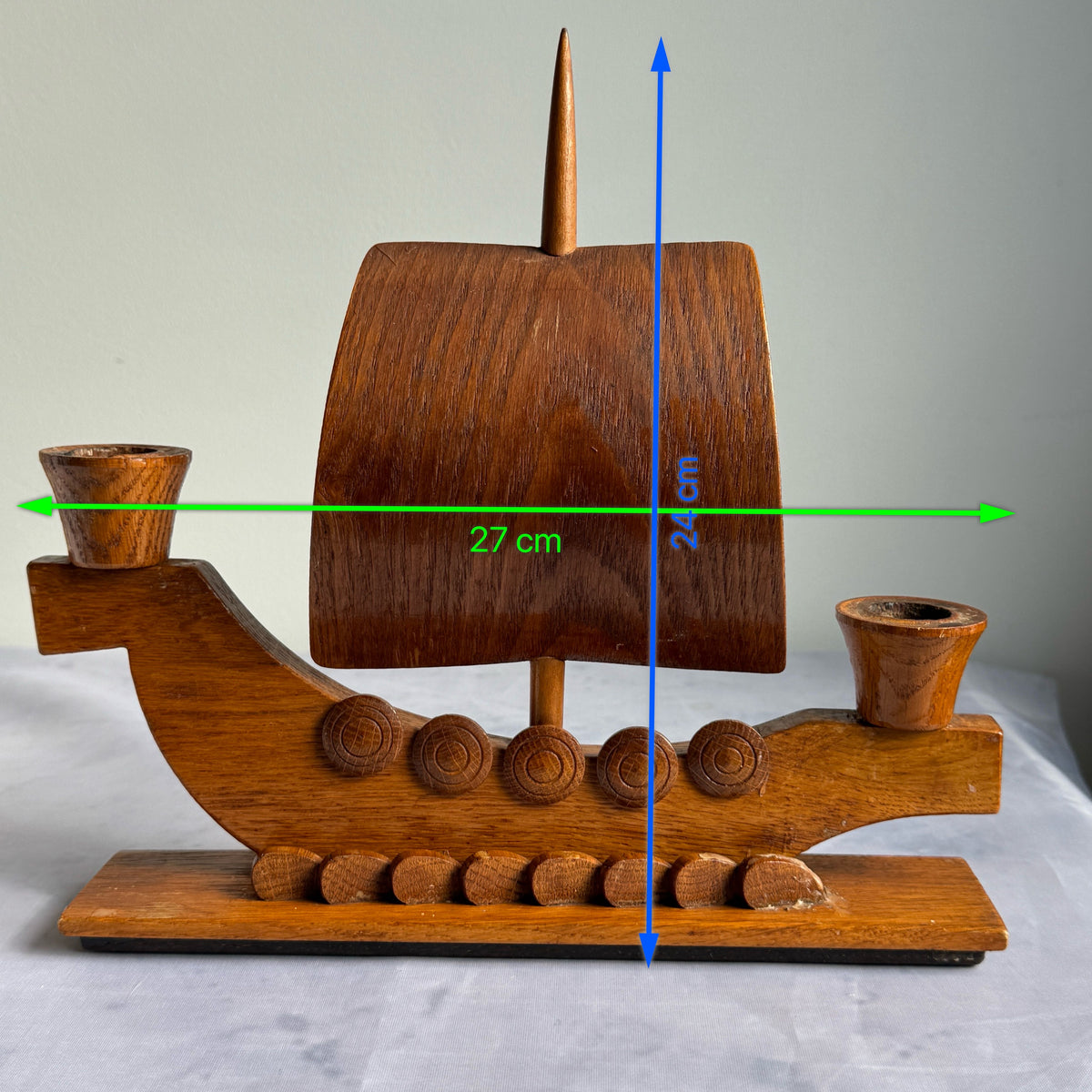 Viking ship candle holder with measurements 27 cm wide, 24 cm high